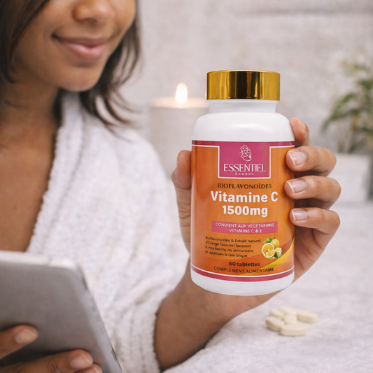 Une femme tenant la vitamine c